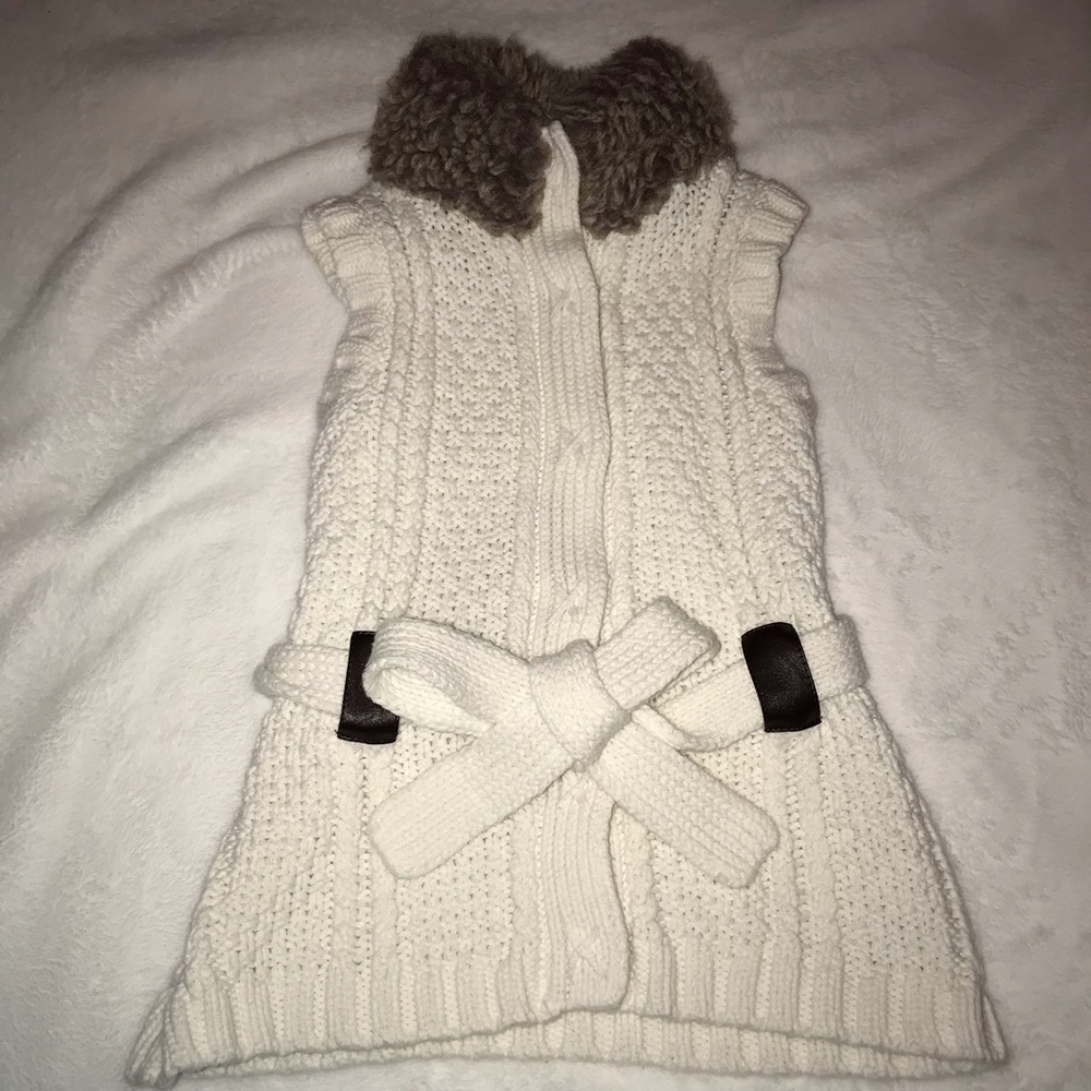Sleeveless Knit Sweater.